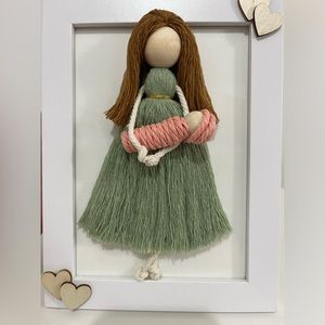 Handmade macrame doll frame
